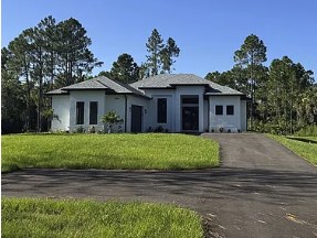 New construction home on 2.73-acre lot at 4273 16th Ave NE, Naples FL